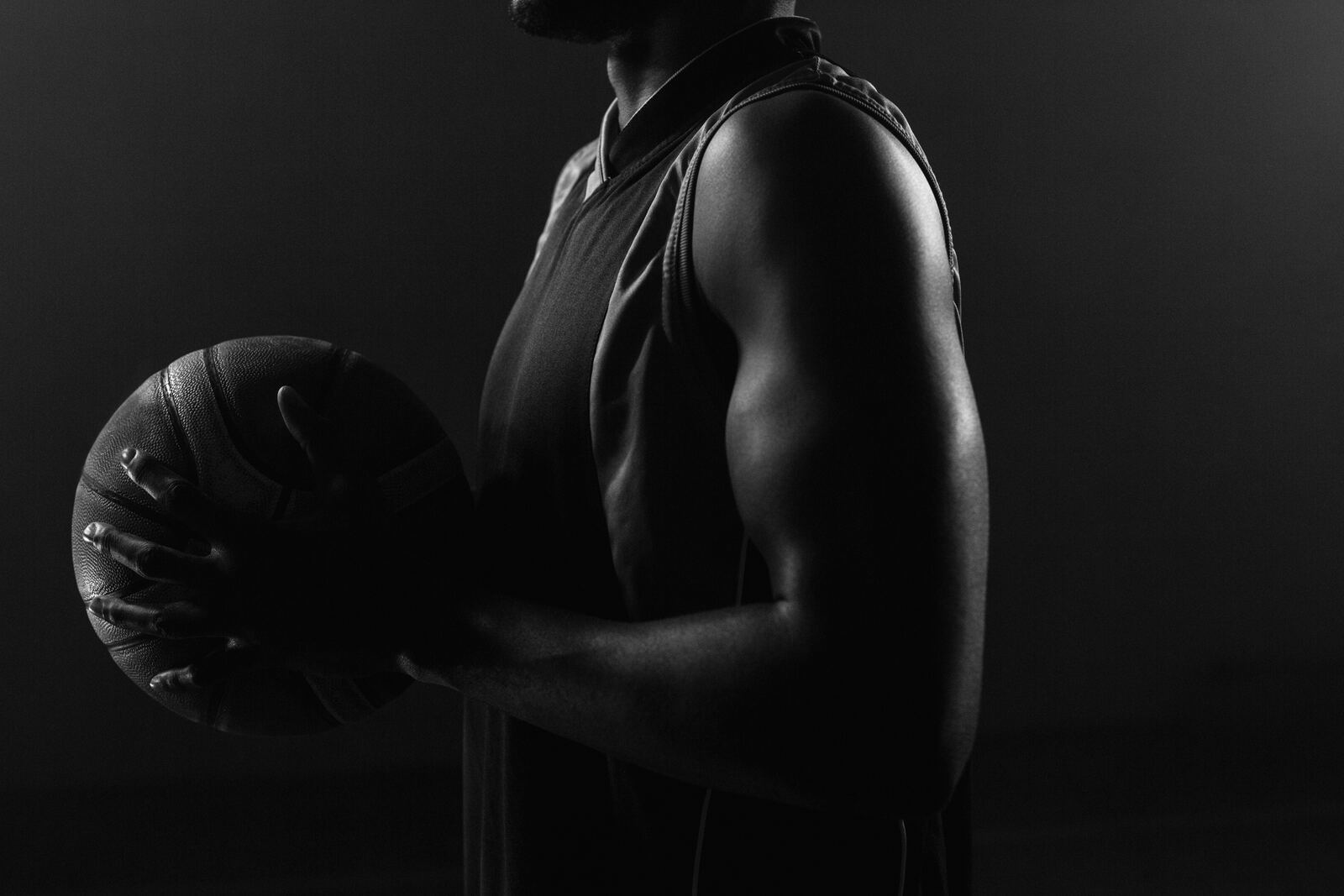Basketball player holding a ball