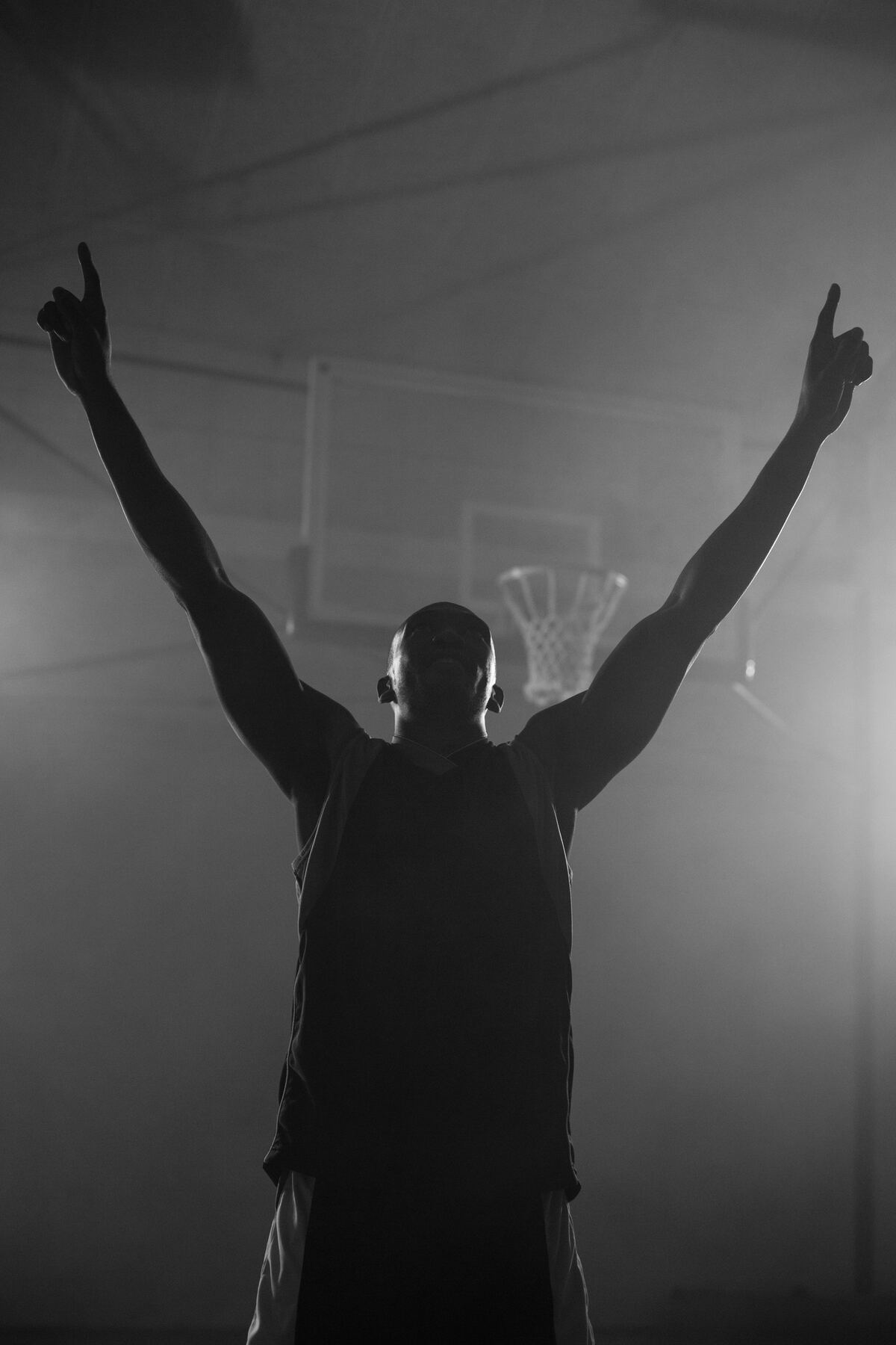 Athlete celebrating with raised arms